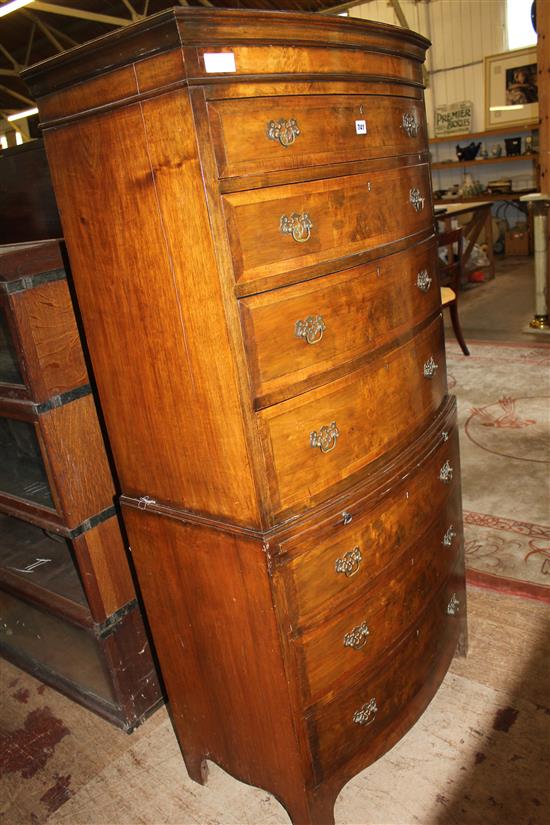 Bowfront walnut chest on chest